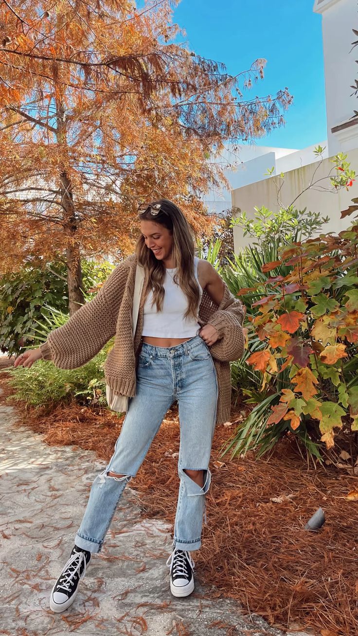 Blue Ripped Jeans and Black Sneakers 